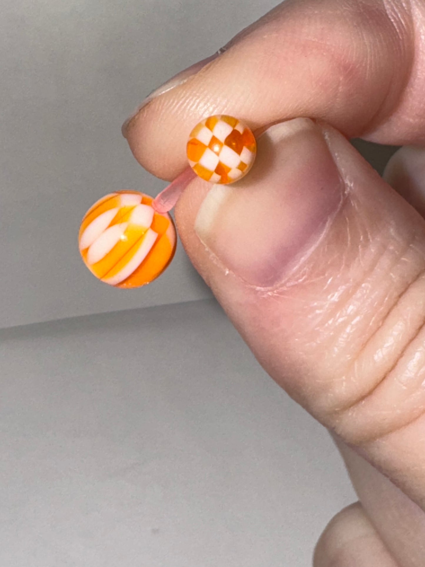 14 Gauge Orange and White Checkerboard Design Belly Ring