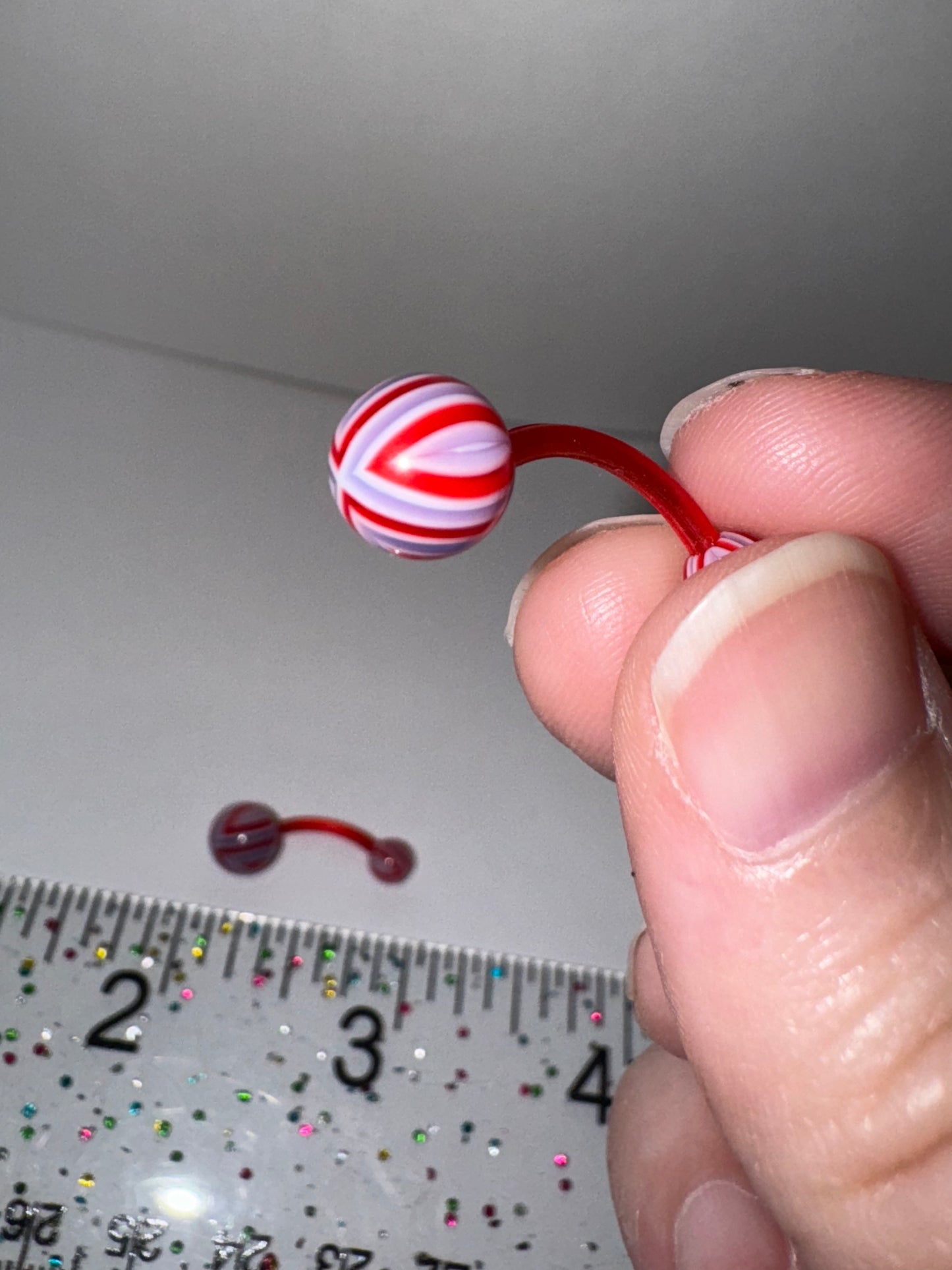 14 Gauge Red, White, and Purple Flag Design Belly Ring