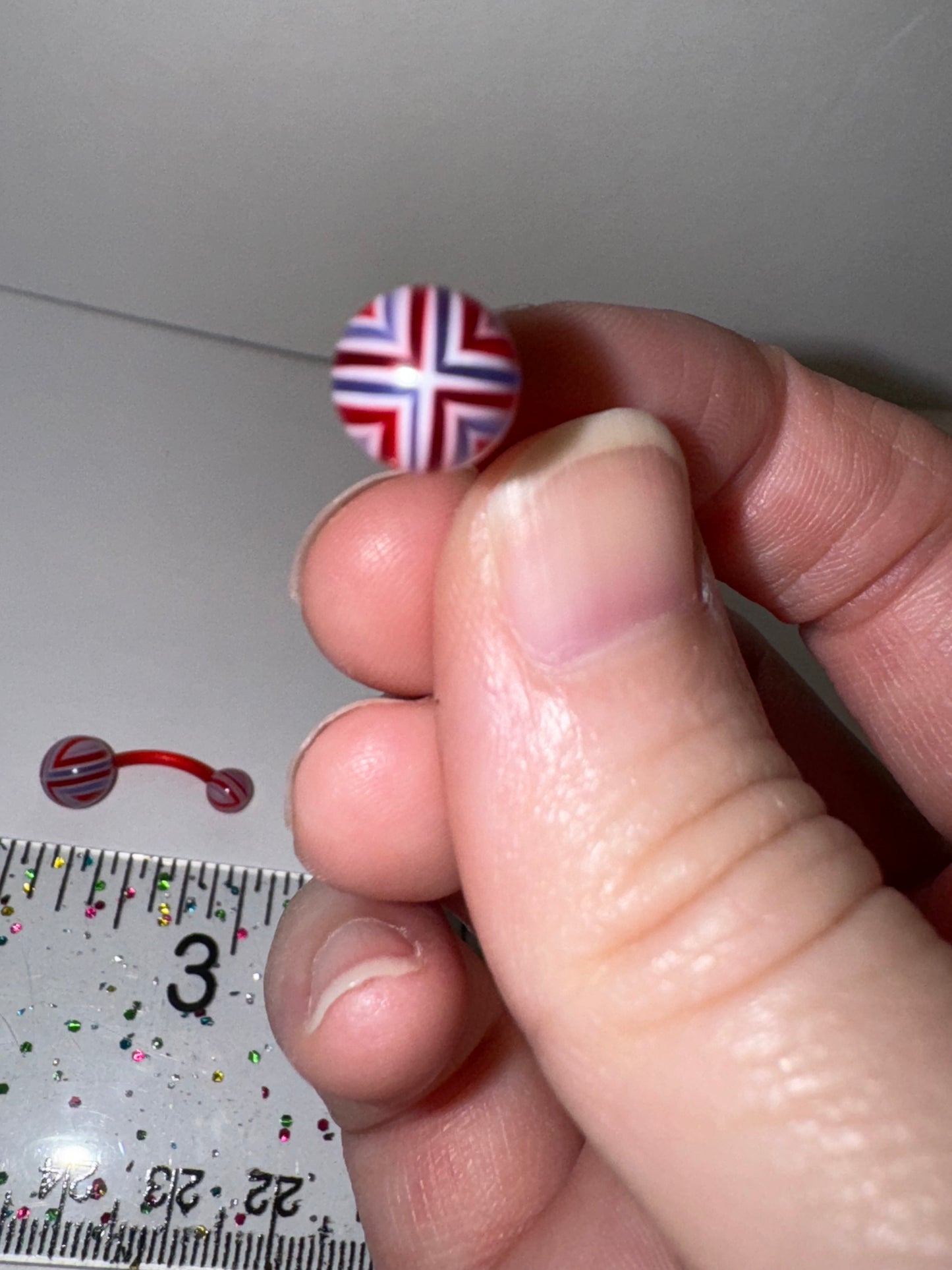 14 Gauge Red, White, and Purple Flag Design Belly Ring